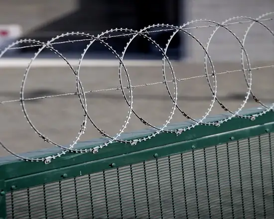 Effective flat razor wire barrier for restricted areas.